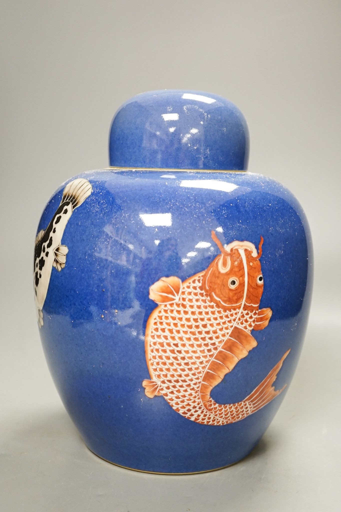 A Chinese powder blue ‘fish’ ginger jar and cover, 26cm